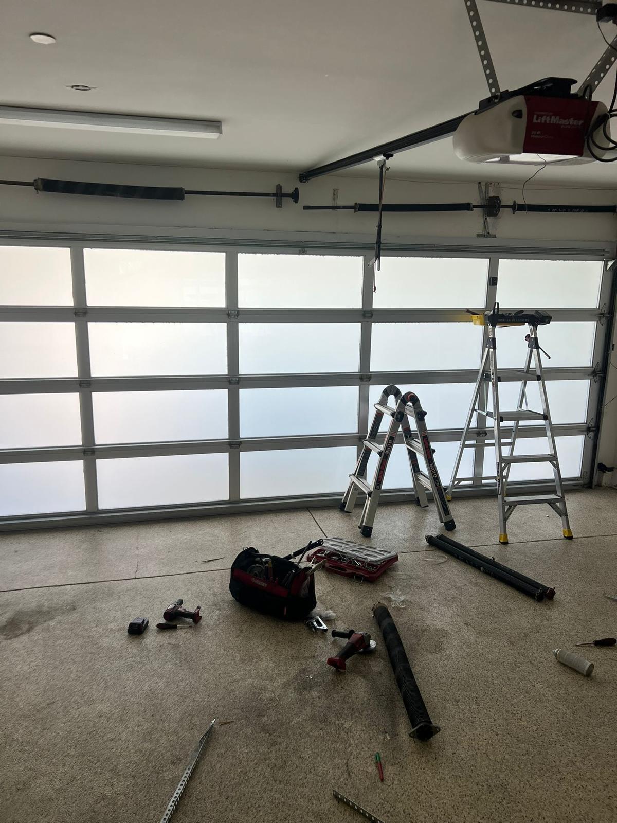 Full-view glass garage door with new LiftMaster opener