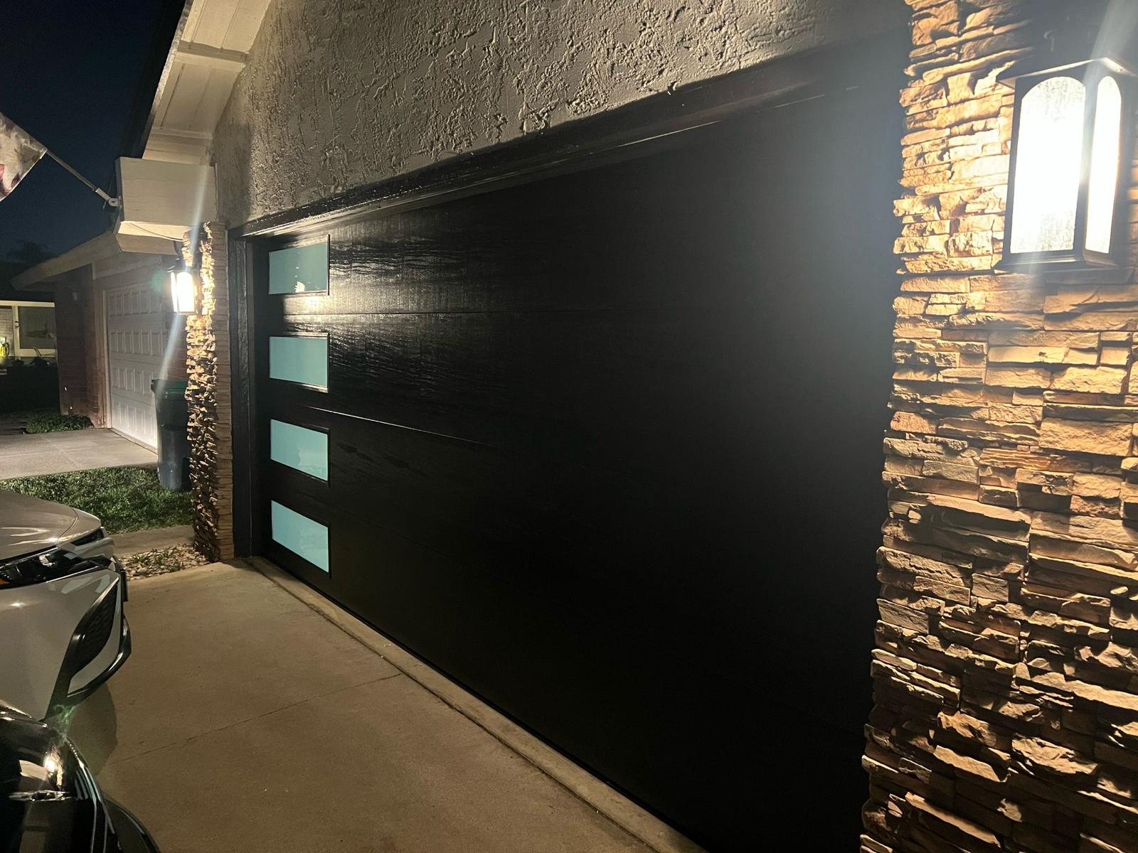 Modern black garage door installation
